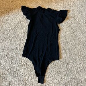 black high neck short sleeve soft body suit with frilly sleeves